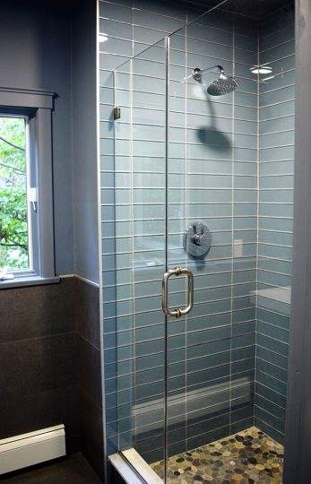 New shower remodel with subway tiles and pebble floors in Lincoln, MA
