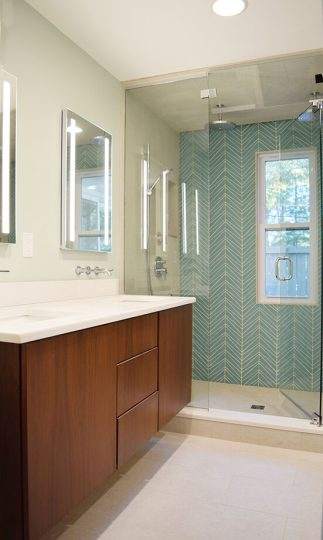 New vanity and new glass shower in bathroom remodel in Lincoln, Massachusetts