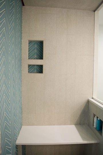 Shower bench with herringbone tile in Bathroom Remodel in Lincoln, Massachusetts