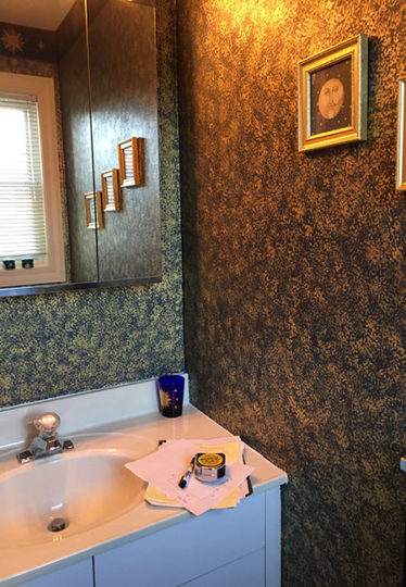 Previously dark, wallpapered Watertown bathroom