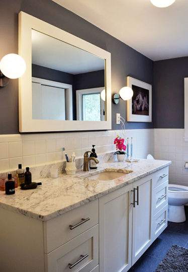 Needham, MA bathroom remodel with new lighting and painted cabinets