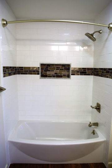 New shower and bath tub with white tiles in West Newton, MA