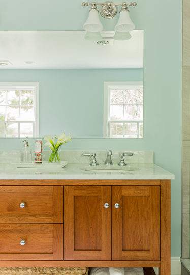 New double vanity with lighting fixtures in Dover, MA