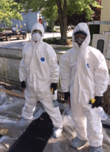 Painters wear suits to protect from EPA hazards.