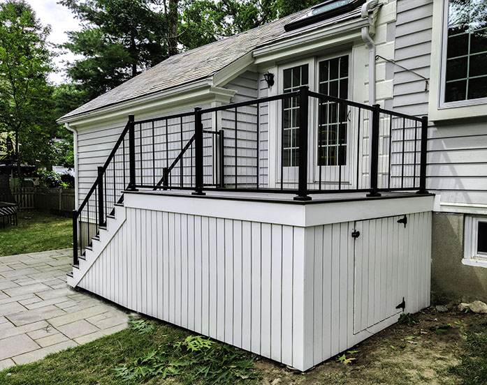 Timbertech deck with built-in outdoor storage in Wellesley, MA