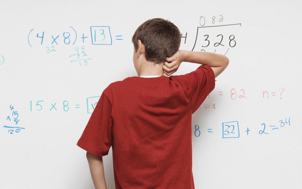 child solving math problem